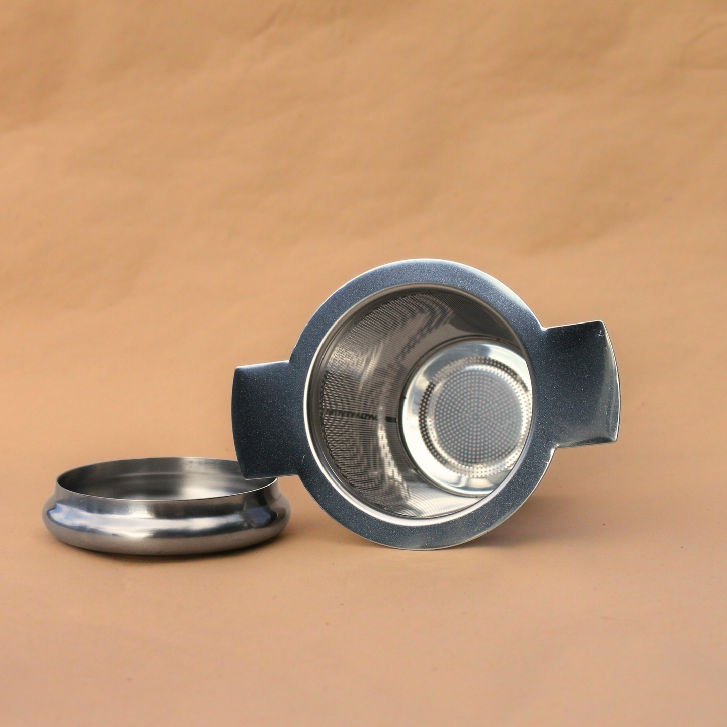Flora & June's stainless steal tea infuser in silver.